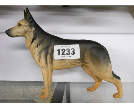 A Beswick pottery figurine depicting a German Shepherd with matte glaze finish - named to base CH Ulrica Brittas