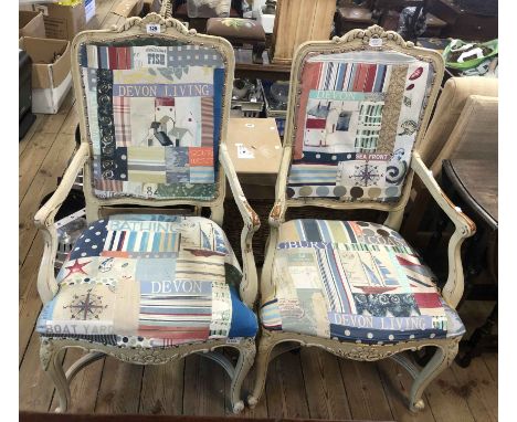 A pair of shabby chic painted framed panel back elbow chairs with local interest patchwork upholstery, set on cabriole front 