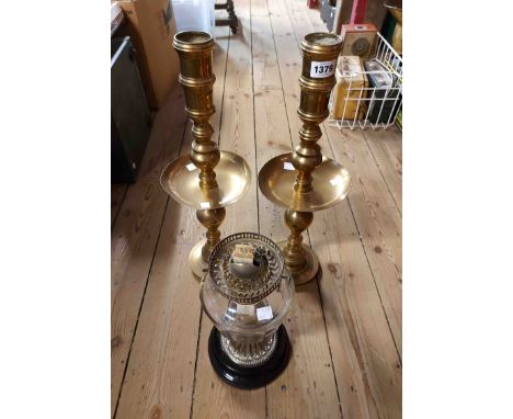 A pair of large 20th Century spun brass candlesticks with central drip trays in the antique style - sold with a Victorian oil