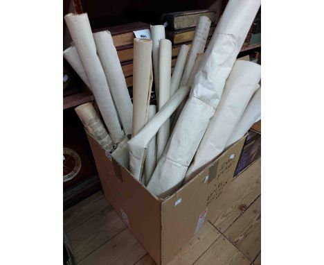 A box containing a collection of vintage mainly Ordnance Survey rolled maps including West Country interest, also two posters