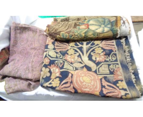 An antique tapestry panel depicting a putti reclining amidst fruit flanked by a pair of eagles and a similar wall hanging tap