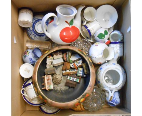 A box containing a quantity of assorted ceramic and glass items including miniature pottery cottages, coffee cans, etc.