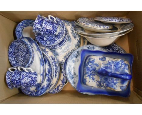 A box containing a large quantity of blue and white ceramics including plates, cheese dish, cups and saucers of various make 