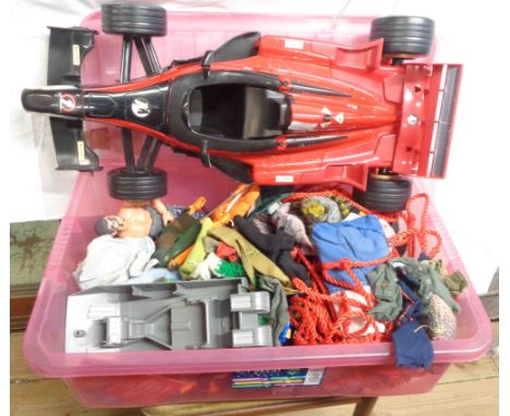 A crate containing a quantity of vintage and later Action Man figures and accessories including clothing, etc. - sold with a 