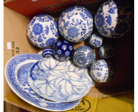 A box containing a quantity of ceramic items including plates, decorative carpet bowls, etc.