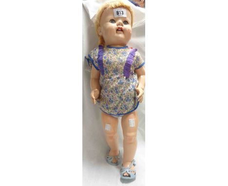 A vintage Wilkinson &amp; Gross doll with crier and shoes marked 'Cinderella No. 4'