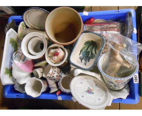 A crate containing a quantity of assorted ceramic and glass items including pair of Poole Pottery candlesticks, Denby plant p