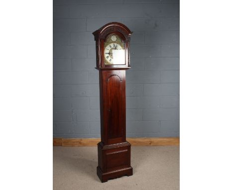 20th Century mahogany veneered longcase clock, the arched blind fret carved hood with reeded half pilasters, the arched dial 