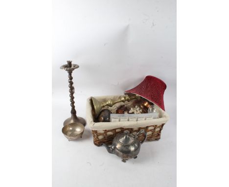 Mixed works of art, to include an eastern brass table lamp, sea shells, two small oil lamps, barley twist candlestick, silver