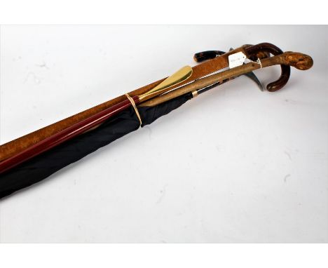 Walking sticks to include alpine style stick, umbrella with gilt metal collar, shoehorn/back scratcher, metre stick (7)
