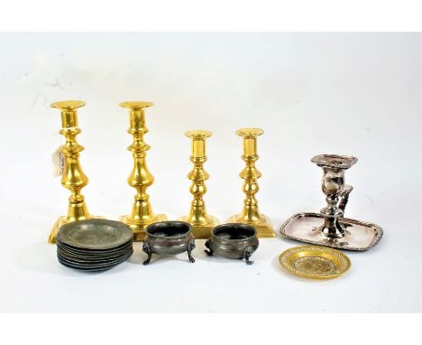 Two pairs of 19th century brass candlesticks, a silver plated chamberstick, nine small pewter dishes, pair of pewter salts, s