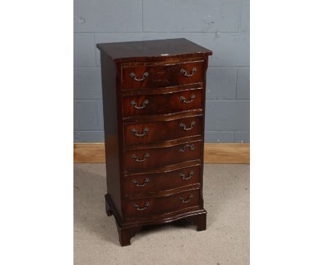 Mahogany veneered serpentine front chest of six drawers, on bracket feet, 48cm wide