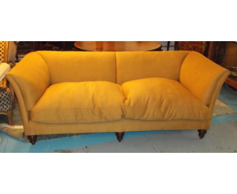 SOFA, modern in sand coloured fabric with two seat cushions and turned feet, 213cm x 98cm.