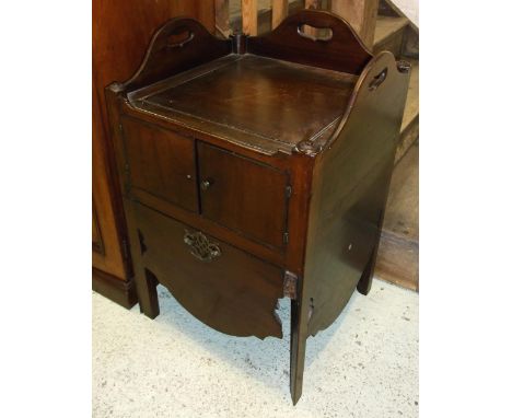 BEDSIDE COMMODE, George III mahogany with two doors and adapted pull out base, 82cm H x 53cm x 50cm. (with faults)
