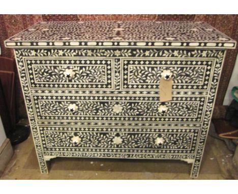 COMMODE, ebonised and bone inlay with two short and two long drawers, 90cm H x 108cm x 50cm.