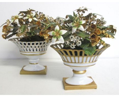 ENAMELLED AND PORCELAIN FLORAL ORNAMENTS, a pair, designed by Jane Hutchinson for the Gorham Company, 26cm H. (2) (some ename