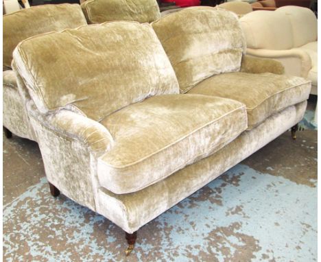 SOFA, two seater, Howard style of large proportions with feather filled cushions in a moss green chenille from Colefax and Fo