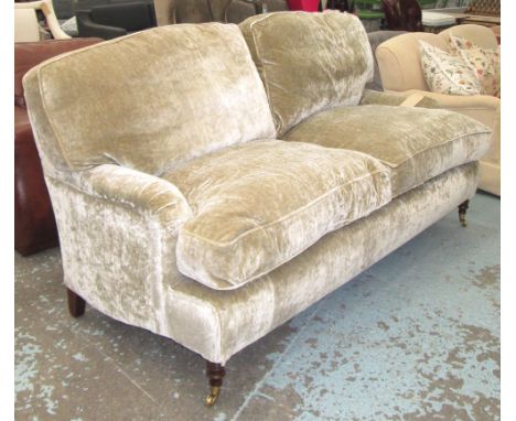 SOFA, two seater, Howard style of large proportions with feather filled cushions in a moss green chenille from Colefax and Fo