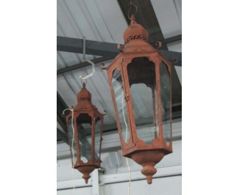 HANGING LANTERN WITH FOLIATE BRACKET, a pair, lantern 82cm x 35cm, bracket 98cm x 30cm. (2)
