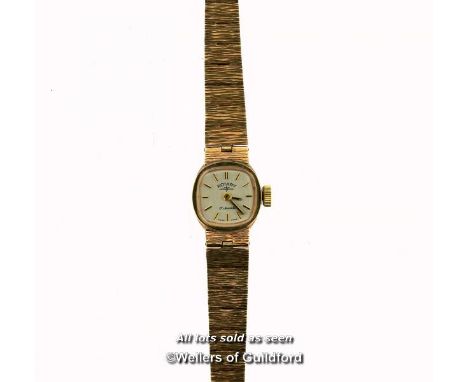 Ladies' Rotary 9ct gold wristwatch, small silvered dial with baton hour markers, presentation watch with engraving on reverse