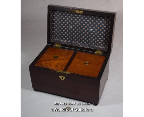 A mahogany two division tea caddy with brass handle and key, 20cm wide.
