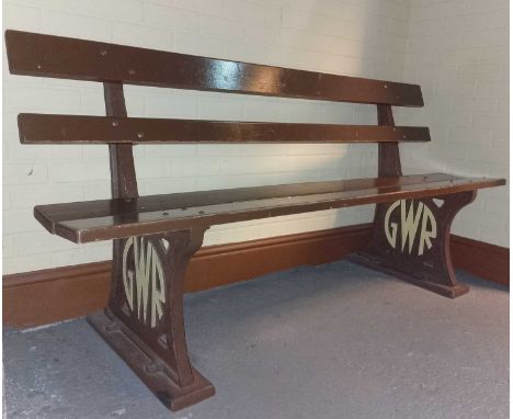 Britain in the Blitz A GWR wooden train platform bench with cast metal bench ends 177cm x 90cm x 56cm.Condition is very good 
