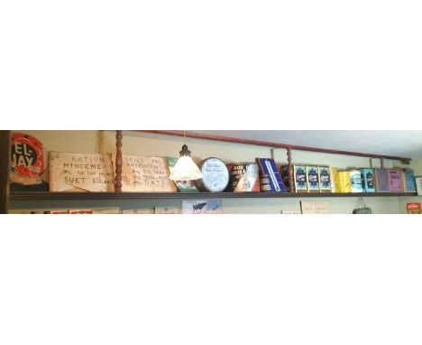 Britain in the Blitz Packaging and advertising  Top shelf contents above the post office counter, to include tins ; Cerebos, 