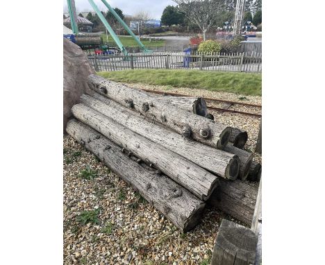 Outside Logs & Fencing  a pile of 7 softwood logs, maximum length 210cm, plus a wooden feed trough, HxL 50x210cm, a horse tie
