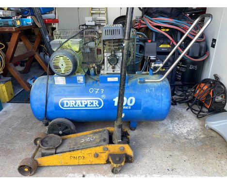 Outside Workshop Tools. A Draper 100 litre air compressor &amp; a trolley jack.The compressor is believed to be working