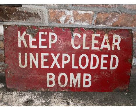 Britain in the Blitz WWII Unexploded Bomb Keep Clear Enamel Sign A WWII "Keep Clear Unexploded Bomb" enamel sign, HxW 35.5x68