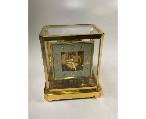 JAEGER LECOULTRE; an Atmos clock in rectangular polished brass case, no.182496, height 23.5cm. 