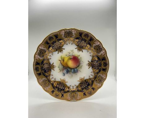 GEORGE COLE FOR ROYAL WORCESTER; a gilt heightened fruit painted cabinet plate, puce printed marks and impressed marks, circa