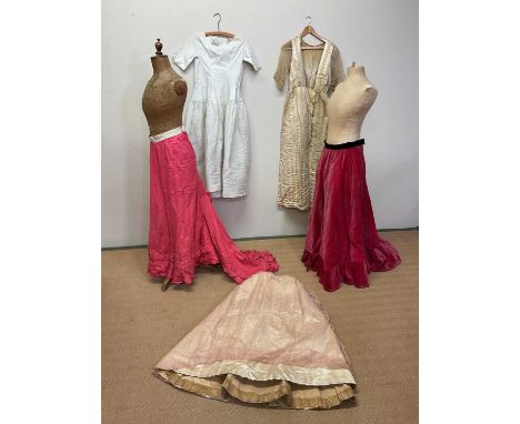 Vintage clothing comprising three re-worked Victorian and Victorian style skirts, an early 20th century silk dress (af) and a