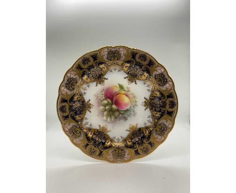 GEORGE COLE FOR ROYAL WORCESTER; a gilt heightened floral painted cabinet plate, puce printed marks, circa 1913, diameter 22.