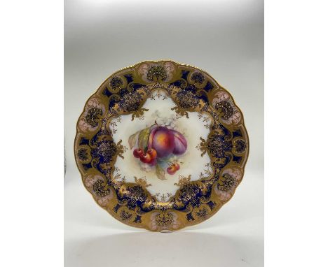 HARRY MARTIN FOR ROYAL WORCESTER; a gilt heightened fruit painted cabinet plate, puce printed marks and impressed marks, circ