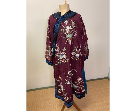 A vintage Chinese silk kimono embroidered with flowers lined with blue silk with blue embroidered bordersCondition Report: Ad