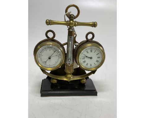 A circa 1900 novelty brass weather station centred with an anchor set with thermometer flanked by rope twist adorned timepiec