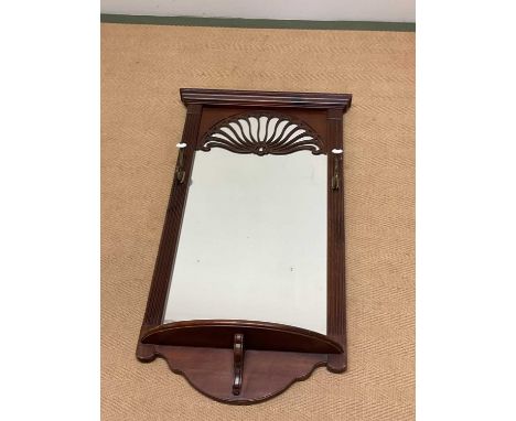 An Edwardian wall mirror, height 103cm, width 57cm, shelf depth 12cm