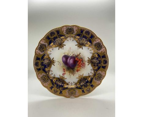 HARRY MARTIN FOR ROYAL WORCESTER; a gilt heightened fruit painted cabinet plate, puce printed marks and impressed marks, circ