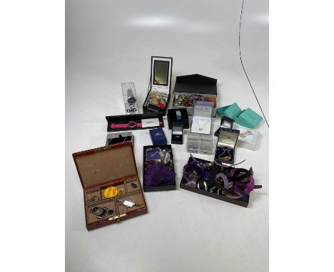 A quantity of costume jewellery and watches to include an Asprey of London box and contents including silver.