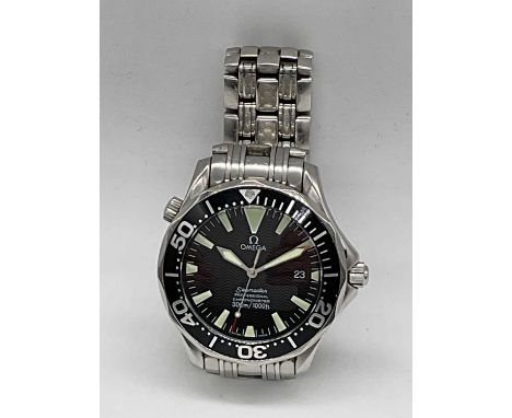OMEGA; a gentleman's stainless steel Seamaster with black bezel and dial, date aperture, diameter 40mm excluding winding crow
