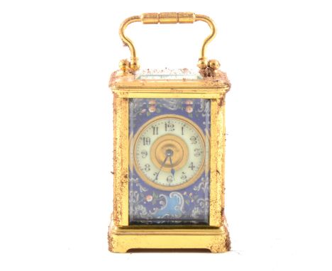 A small French carriage clock, ivorine chapter ring within an enamelled fascia, platform escapement, 8.5cm.
