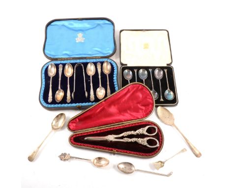 A cased set of six silver teaspoons and nips by Elkington, and other silver flatware including three Georgian silver fiddle p