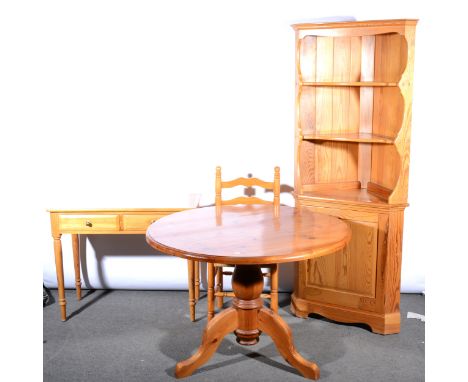 A modern pine breakfast table, circular top, bulbous column, tripod legs, diameter 106cm; a set of five colonial style staine