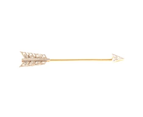A diamond arrow tie pin set with fifteen rose cut diamonds in yellow and white metal, 50mm long,the flight is detachable from