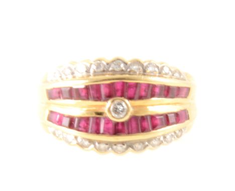 A ruby and diamond multi stone dress ring, a central diamond collet set with a band of square cut rubies to each side and fur