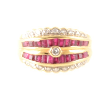 A ruby and diamond multi stone dress ring, a central diamond collet set with a band of square cut rubies to each side and fur