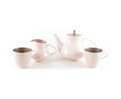 A Poole Pottery two tone part tea service in sepia and mushroom comprising six teacups, three large tea cups, three coffee cu