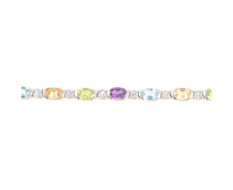 A "rainbow" coloured stone bracelet, the white metal bracelet marked 925 claw set with amethyst, citrine, peridot, heat treat