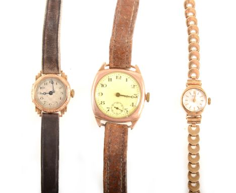 Three gold wrist watches, a lady's 9 carat yellow gold bracelet watch with 12mm baton dial and half moon shaped link bracelet